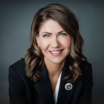 Head and shoulders photo of Kristi Noem, a proponent of the new social studies standards