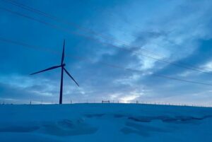  A wind turbine on a farmer’s land near Aberdeen. South Dakota Searchlight photo by Joshua Haiar