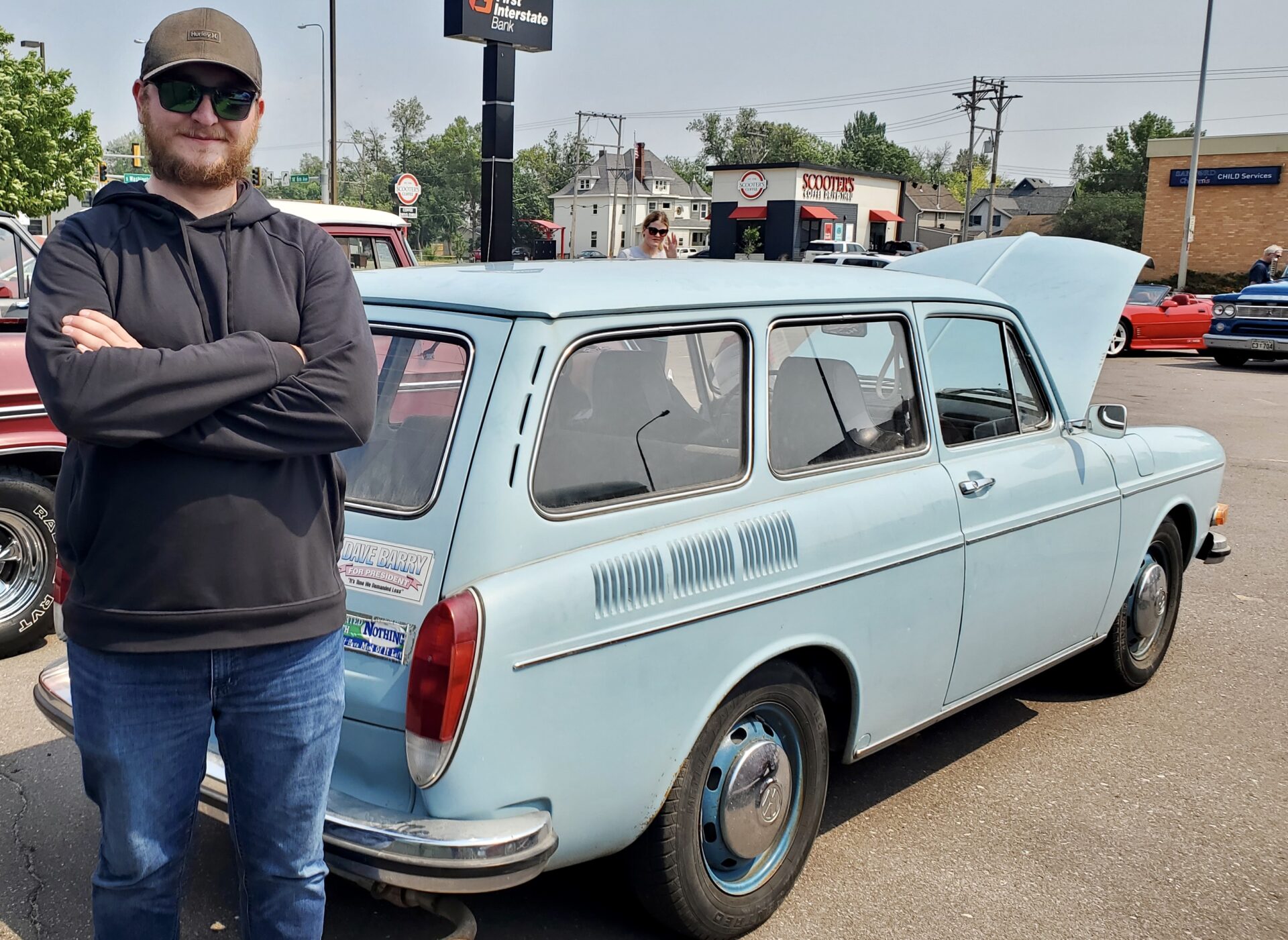 Cole Fehr poses with a 1972 Volkswagen Squareback during a classic car and bike show Sunday, June 25 at Aldersgate Church. Aberdeen Insider photo by Annie Scott