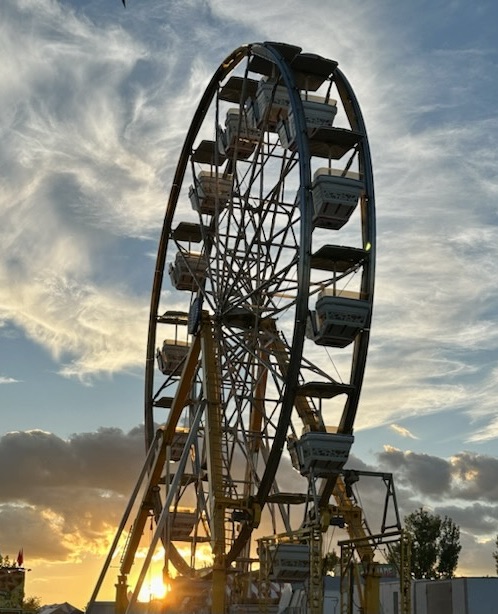 The Brown County Fair opened on Tuesday, Aug. 15. By Tuesday morning, most of the midway equipment had been set up, including the Ferris wheel. Photo courtesy of Mike Scott
