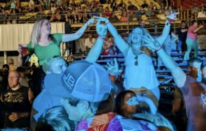 Fans have fun singing along at Friday night's Lill Jon show at the Brown County Fair. Aberdeen Insider photo by Scott Waltman