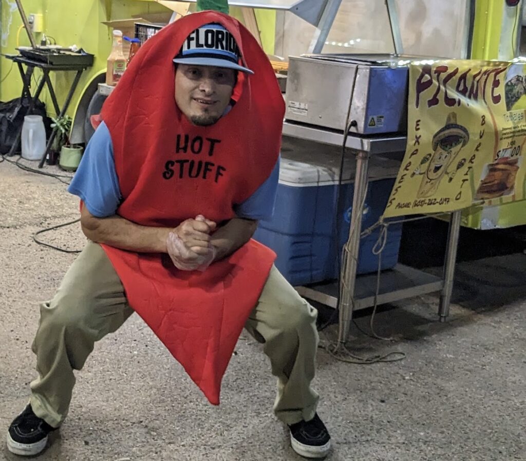 On worker was happy to draw attention to the Picante food trailer Friday night at the Brown County Fair. Aberdeen Insider photo by Scott Waltman