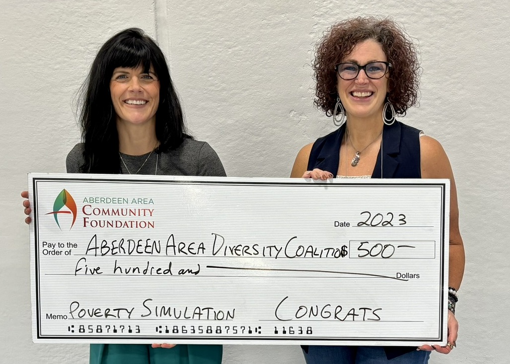 The Aberdeen Area Diversity Coalition received funding of up to $500 from the Aberdeen Area Community Foundation to support a poverty simulation. Pictured from left are Megan Biegler, Aberdeen Area Community Foundation vice chairwoman, and Liesl Hovel, Aberdeen Area Community Foundation president. Courtesy photo