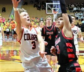Viborg-Hurley's Jake Austin drives to the rim on Lyman's MJ Diehm during the first quarter of the their Class B Boys State Tournament quarterfinal Thursday, March 19 inside the Barnett Center. Aberdeen Insider photo by Robb Garofalo.