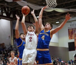 Aberdeen Christian's Grady Jett goes up for a shot in between Castlewood's Brody Bass (4), and Leonard Wernke during the Class B Boys State Tournament quarterfinal Thursday, March 19 inside the Barnett Center. Castlewood came away with a 53-50 win. Photo by Kevin Foss for the Aberdeen Insider.